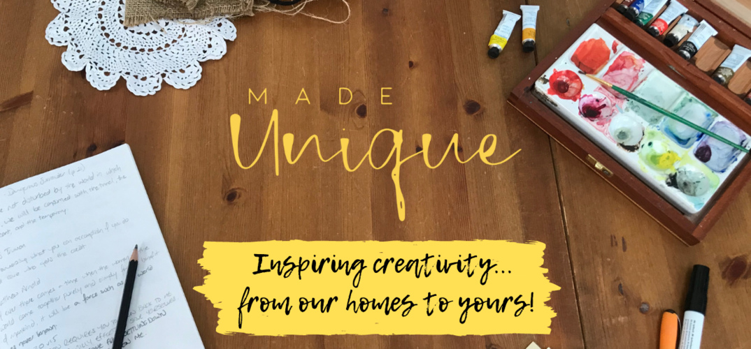 A table of craft supplies with 'Made Unique' text on top