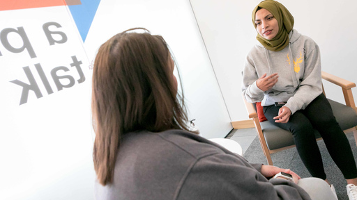 a student and llectuerer talking